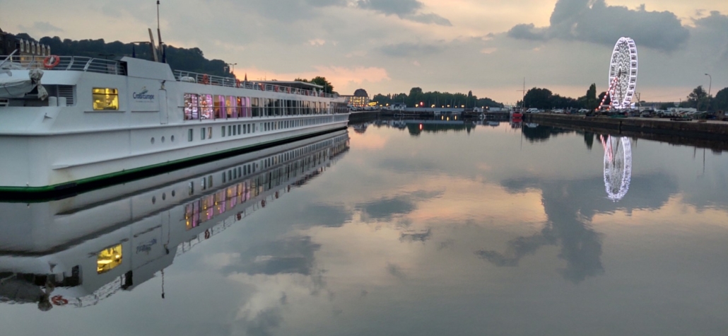 A river cruise boat moored at Honfleur, Normandy