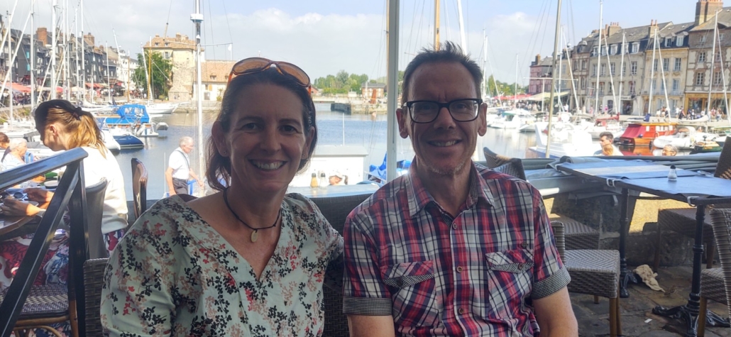 Couple in a restuarant on the old quay in Honfleur