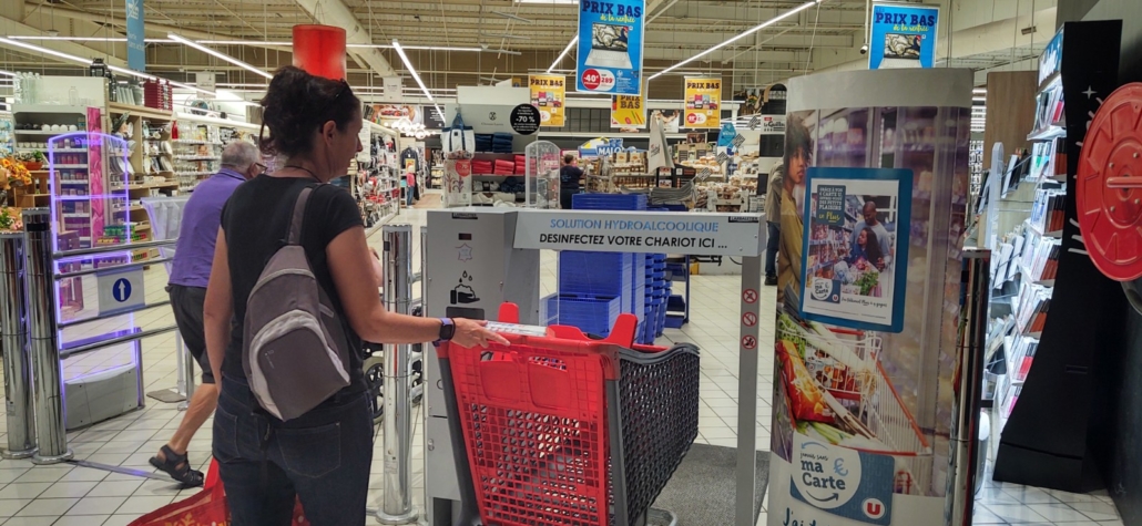 A legacy of COVID at a French supermarket - a trolley disinfecting machine