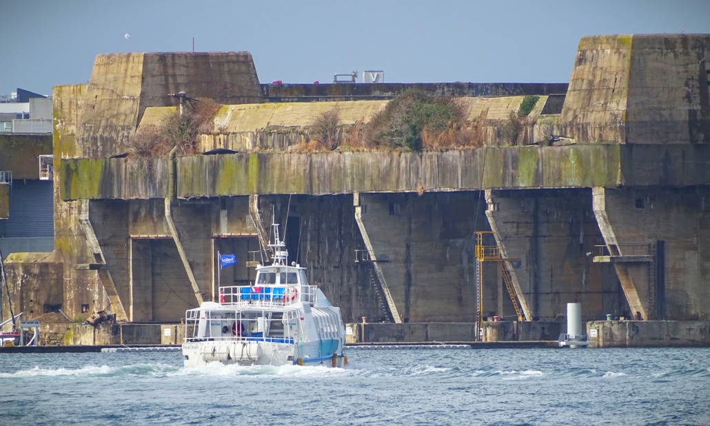 A ferry heading across the front of Keroman 3 at Lorient