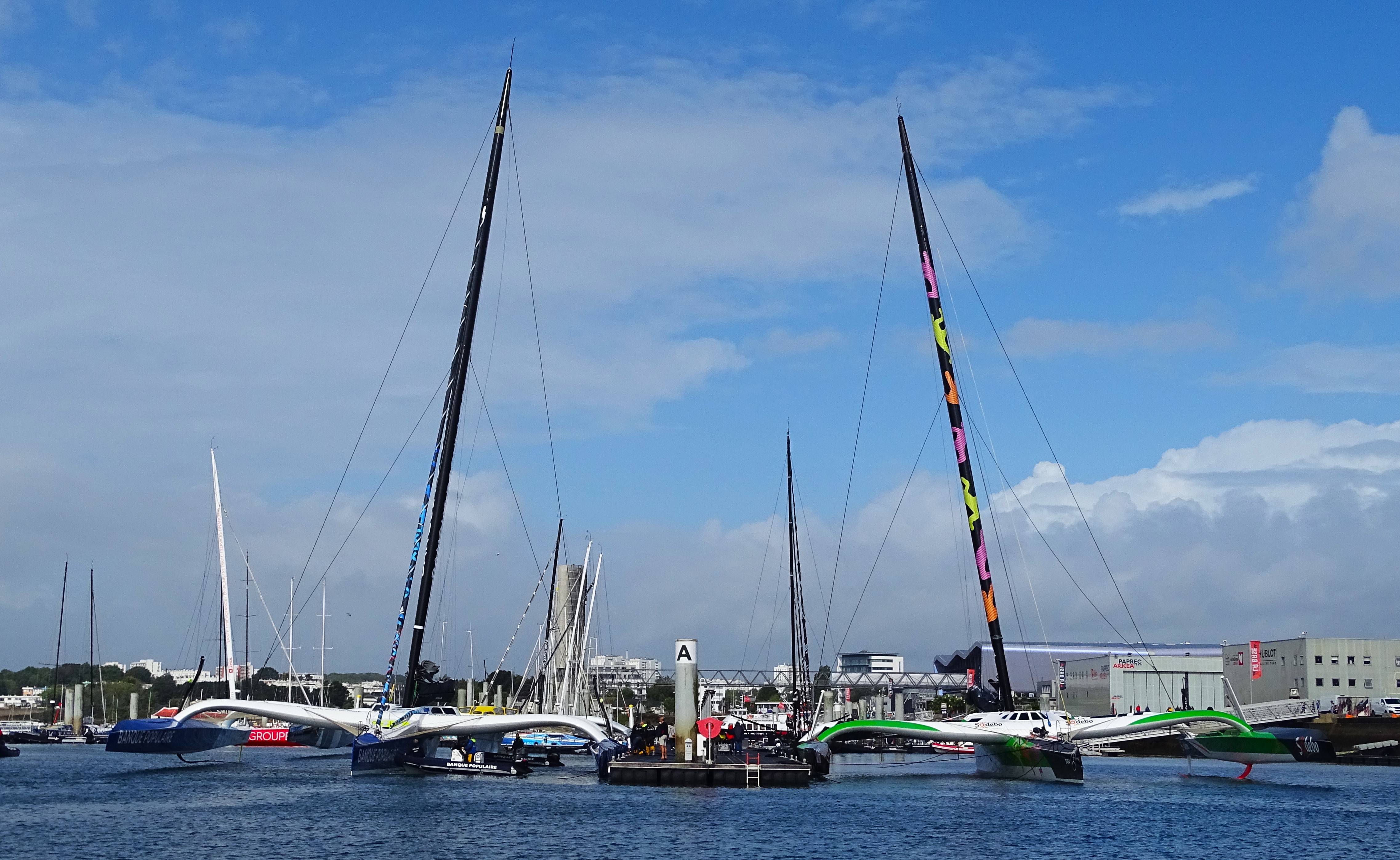 Mega-speedy yachts in the waters next to the Keroman sub pens in Lorient