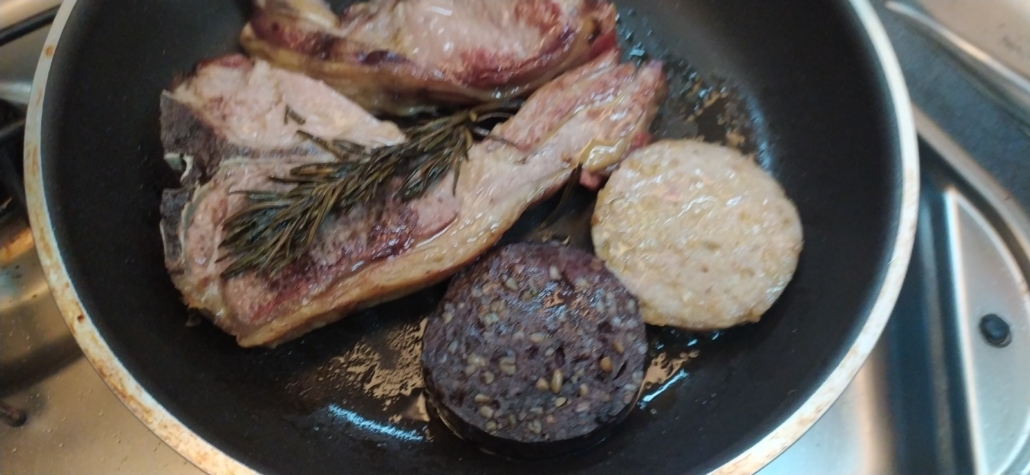 Irish lamb chops, black pudding and white pudding, being fried