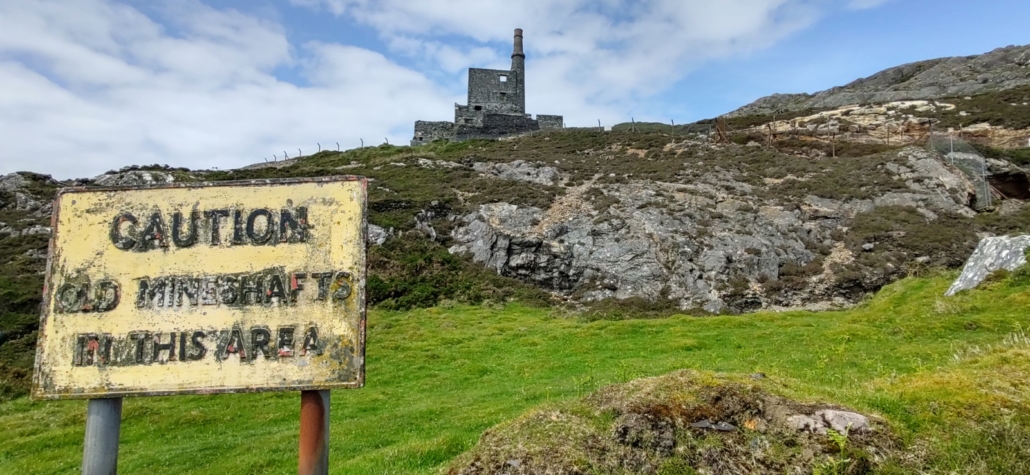 Copper mining engine house with warning sign