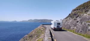 Ourtour Couple Relaxing in the Sunshine by Their Motorhome in Croatia