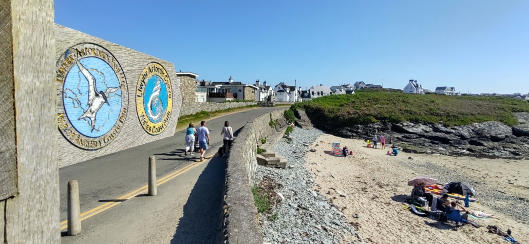 Signs for the Wales Coastal Path and Anglesey Coastal Path