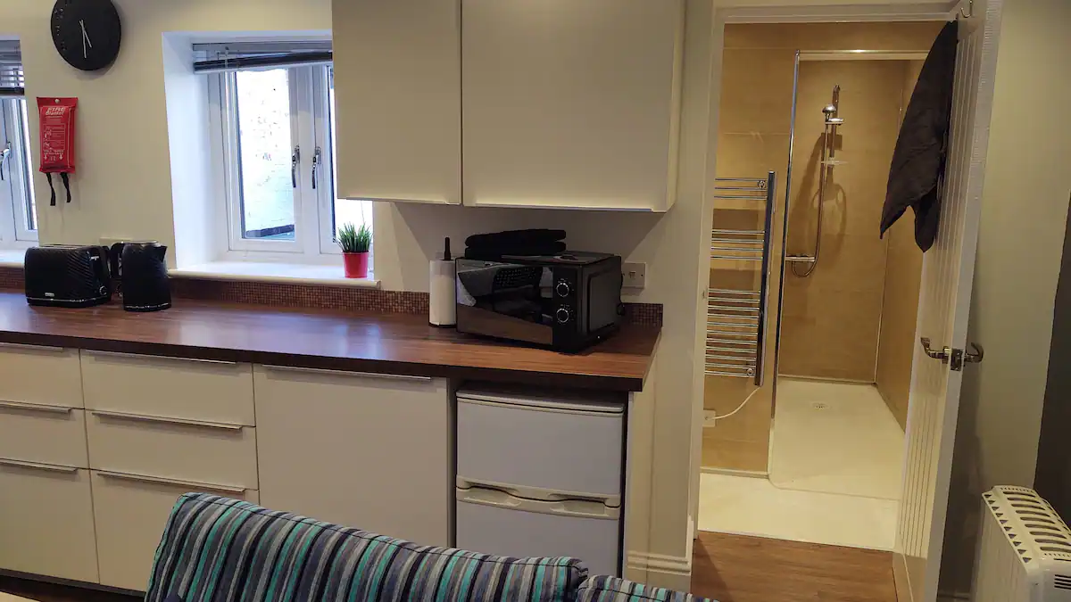 Kitchen and wetroom in the Kimberley Hideaway, AirBnB Nottingham