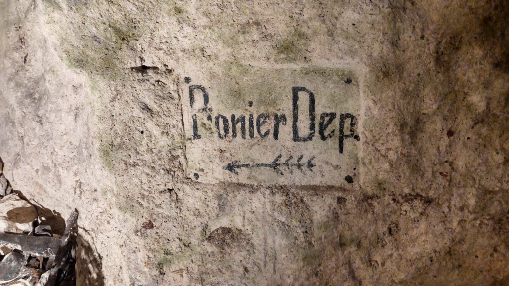 A German signpost on a wall of the  Caverne du Dragon cave complex