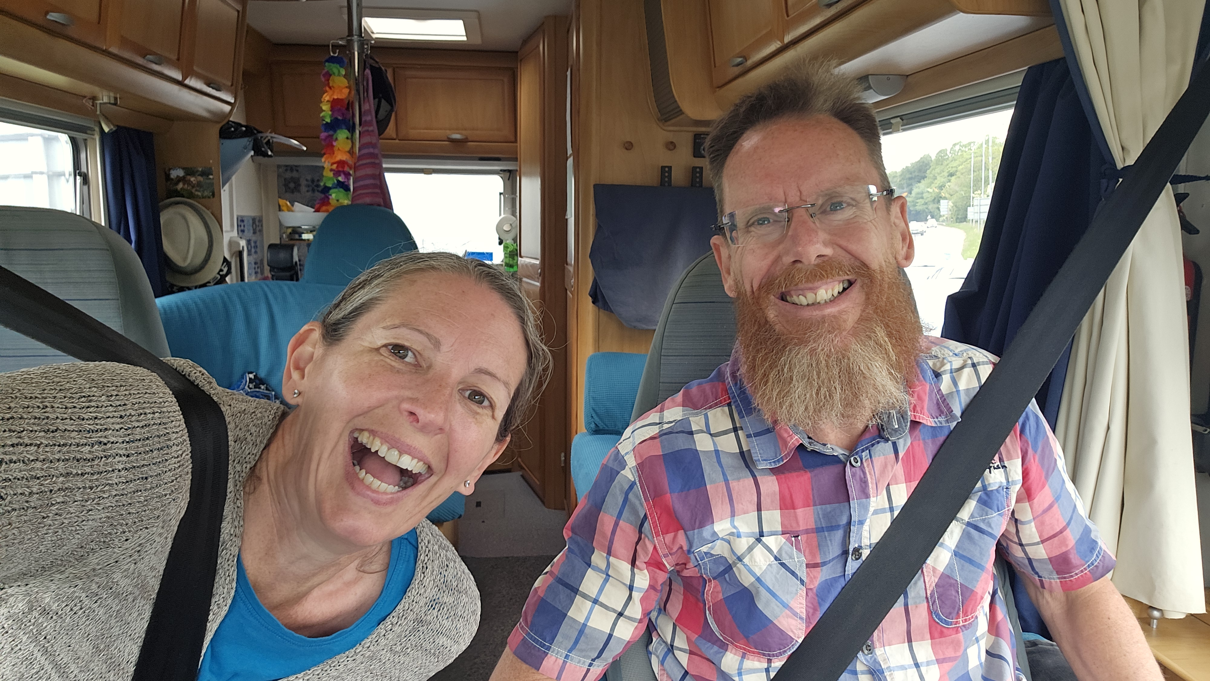 Us two pretending to be relieved we're not being fined for driving a big, dirty, smelly old motorhome