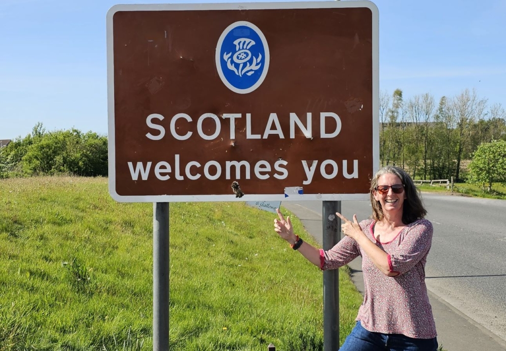 Ju and welcome to scotland sign