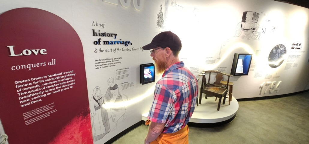 Jason looking at information boards in the Gretna Green Experience museum