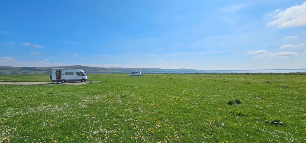 Massive pitches at this quirky motorhome aire at Wig Bay near Stranrear, sited on a WW2 airbase