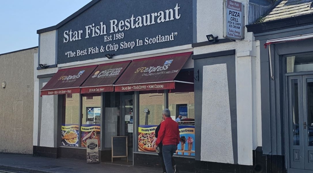 Fish restaurant with sign stating 'best fish and chip shop in scotland.