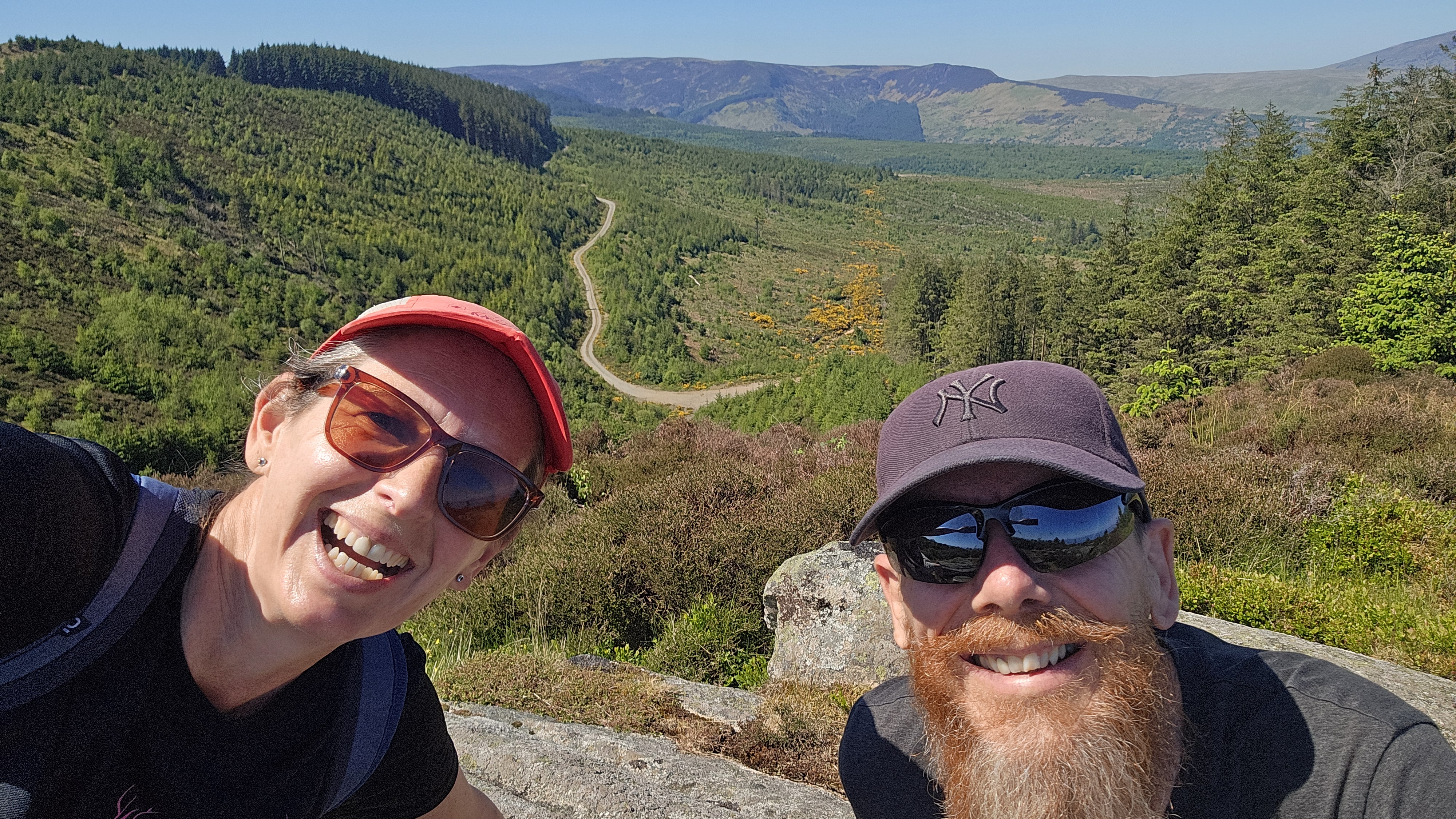 Us with a forest path behind us 