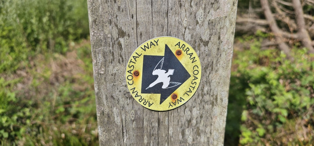 The Arran Coastal Way marker complete with diving gannet