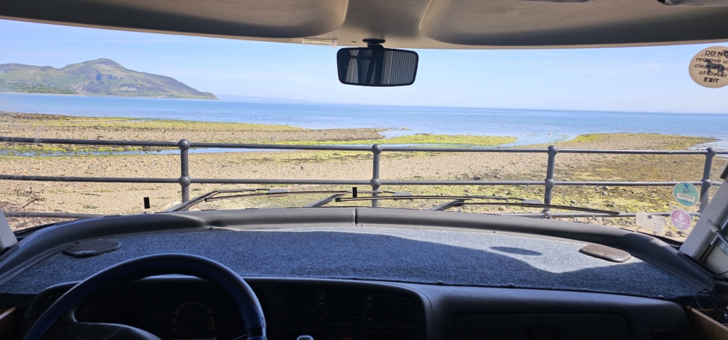 View from the windscreen at a tolerated parking area in Whiting Bay, a good start for the Giant's Grave walk
