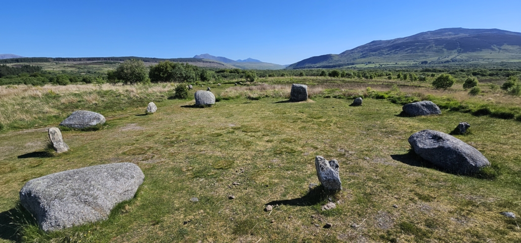 Stone circle in grass field