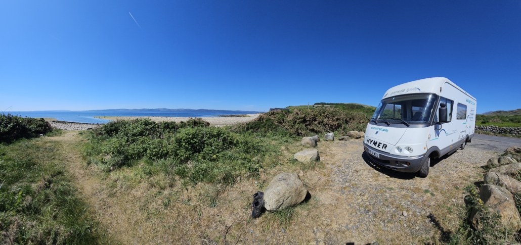 Motorhome parked by a beach, wild camping Arran