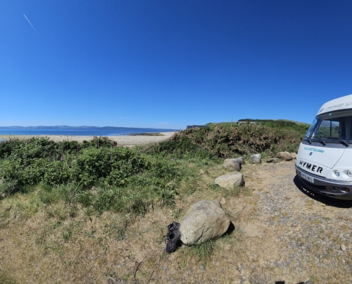 Motorhome parked by a beach