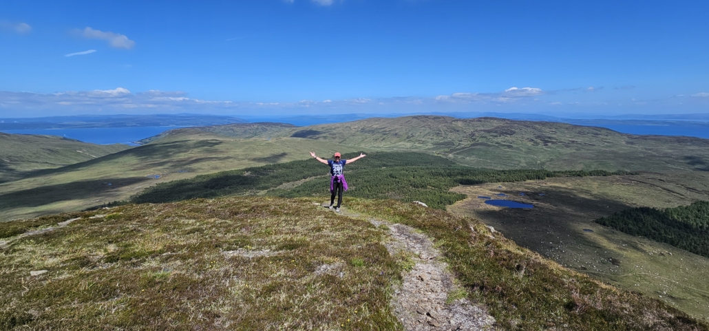 Ju on a hill with views all around