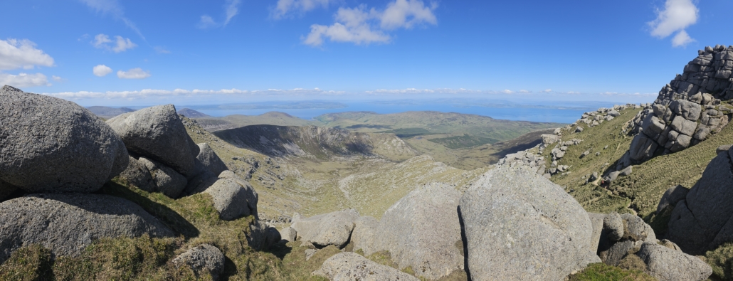 Views of hills and sea from top of a hill