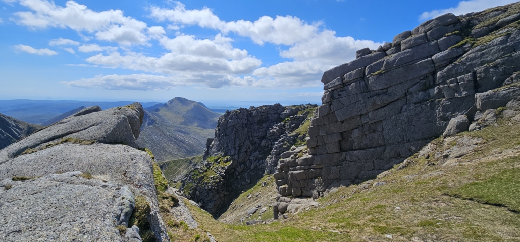 Views of hills and sea from top of a hill