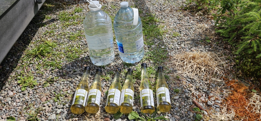 White wine vinegar and water bottles