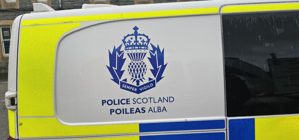 Scottish police van with Police Scotland written in English and Gaelic