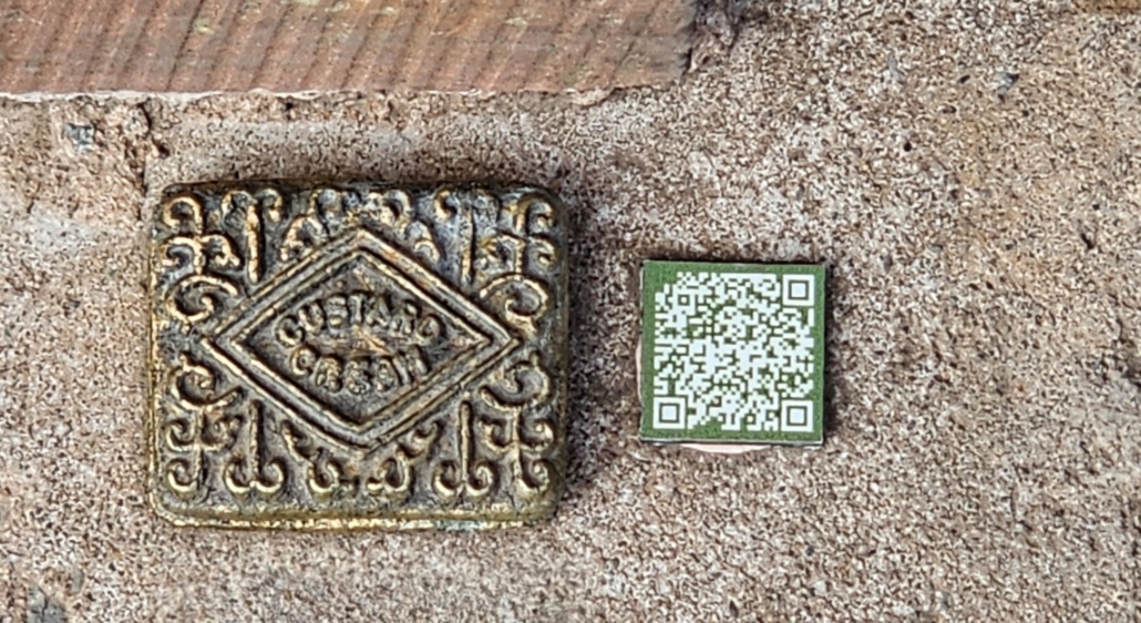 metal custard cream biscuit and QR code