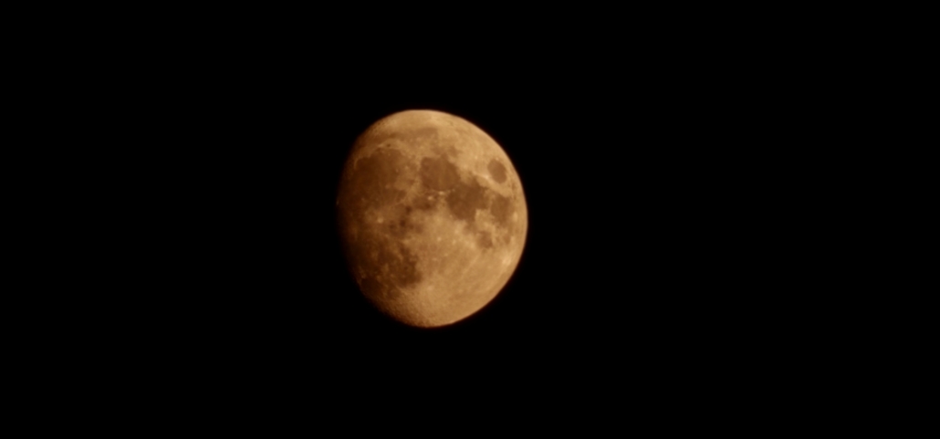 Orange coloured moon