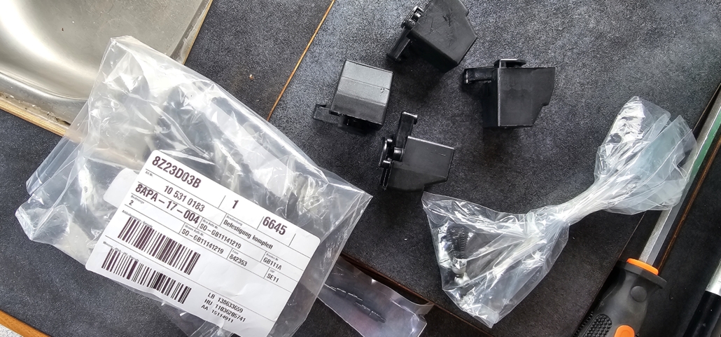 The SMEV hob fixing kit (plastic clamps) which go under the motorhome hob and secure it to the worktop