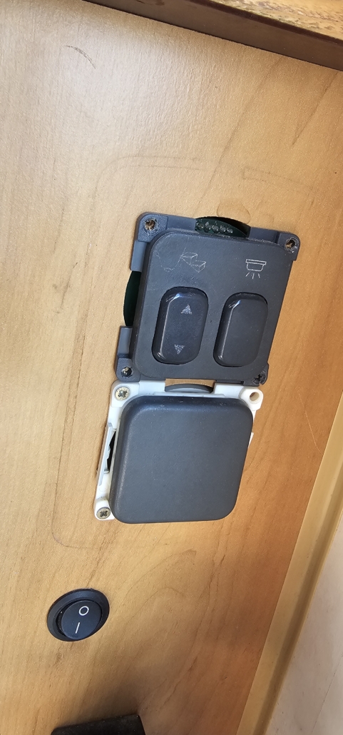 The step and light switches on a Hymer B544 motorhome