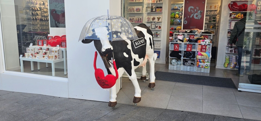 Ale Hop shop cow with umbrella