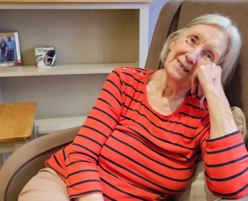 Judith Smith sitting in a chair