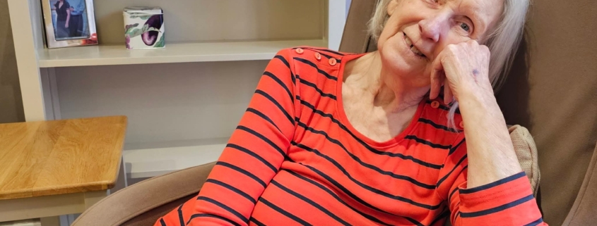 Judith Smith sitting in a chair