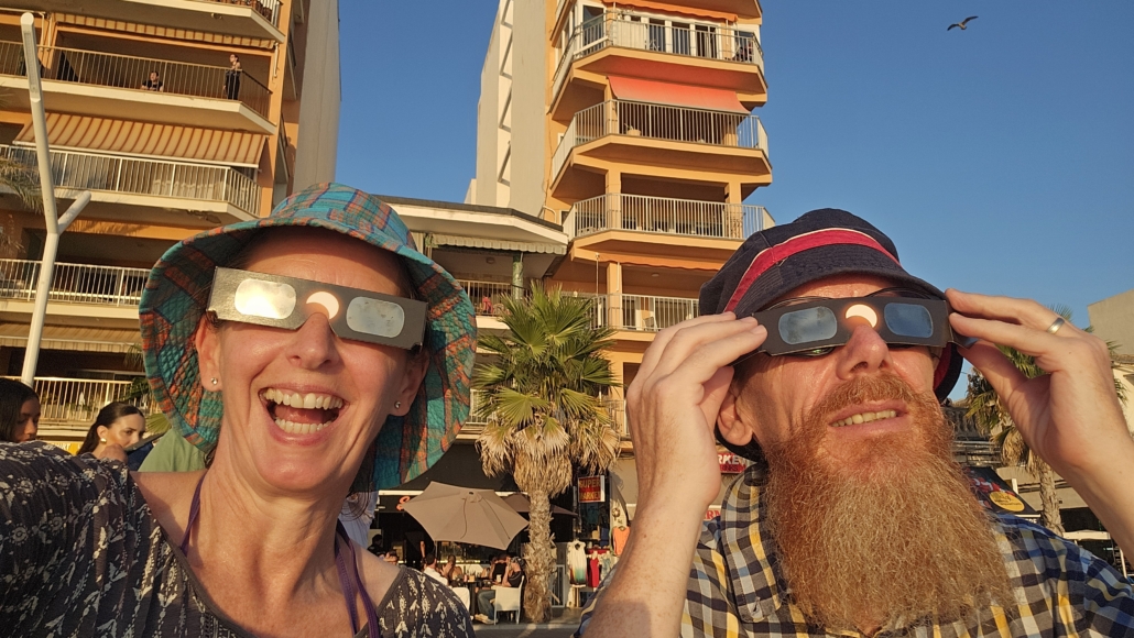 Julie and Jay with solar eclipse glasses on