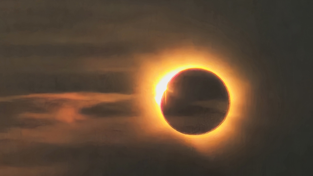 Images of the sun with moon covering increasing amounts of the sun