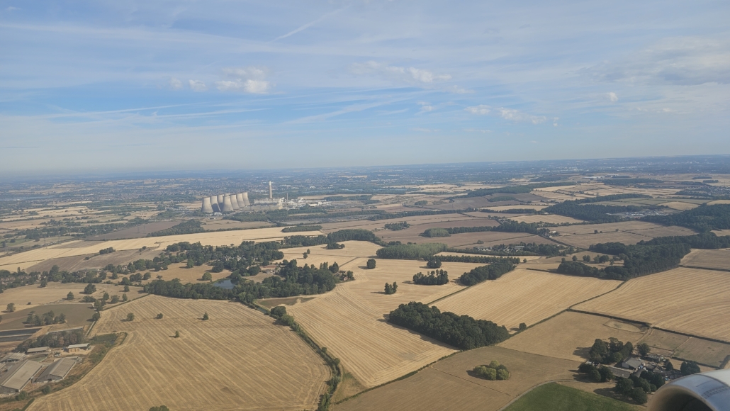 View from aeroplane of yellow dry fields